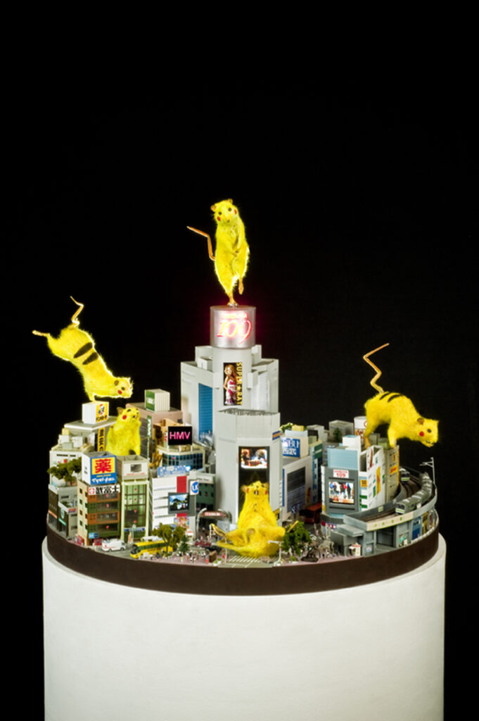 SUPER RAT (diorama), 2008, 5 rats (stuffd after being caught in Shibuya), diorama of the town Shibuya, video, monitor, etc. 136×φ87cm, Photo: Umekawa Yoshimitsu, Courtesy of the Chim↑Pom Studio